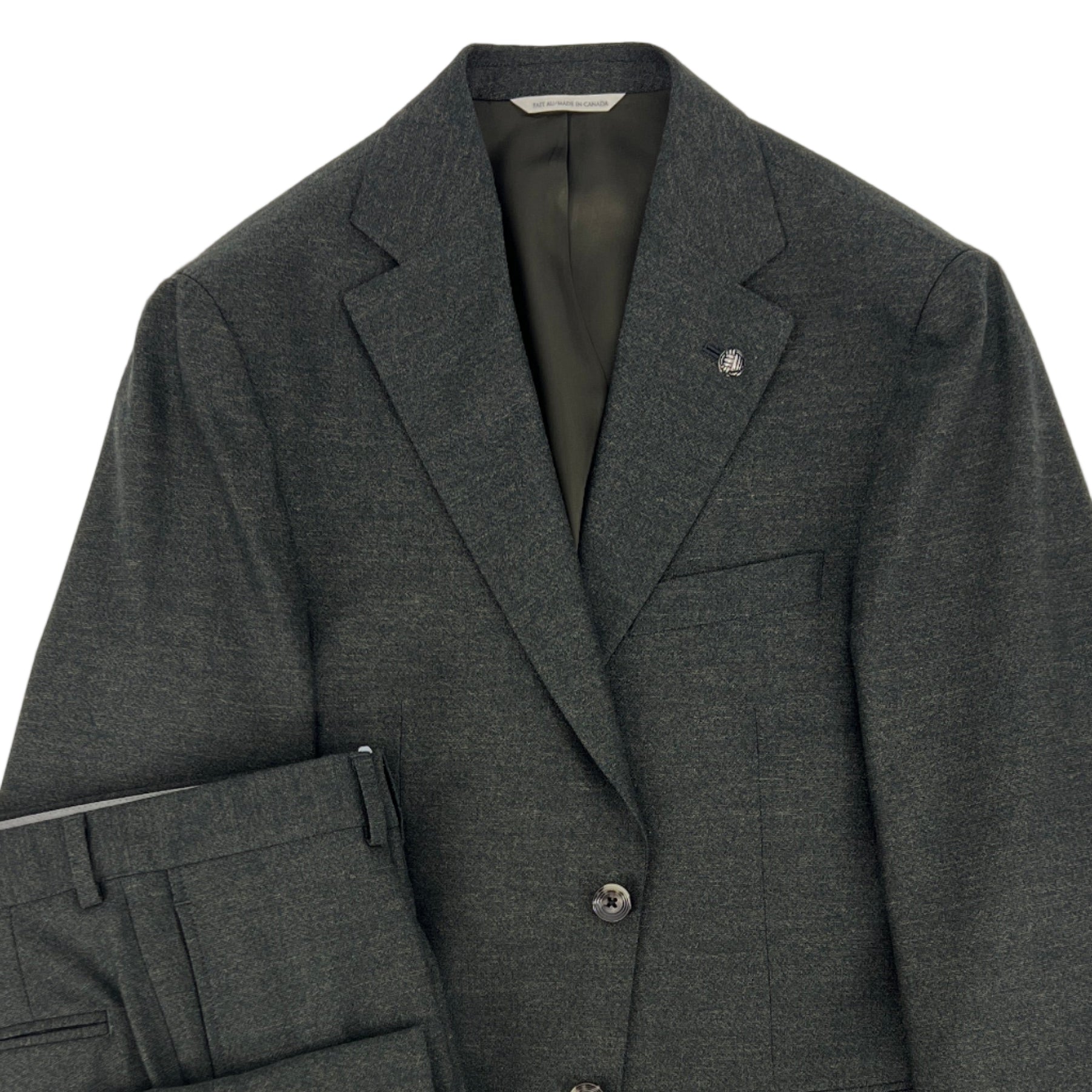 Complet vert avec épaule souple de style napolitain.