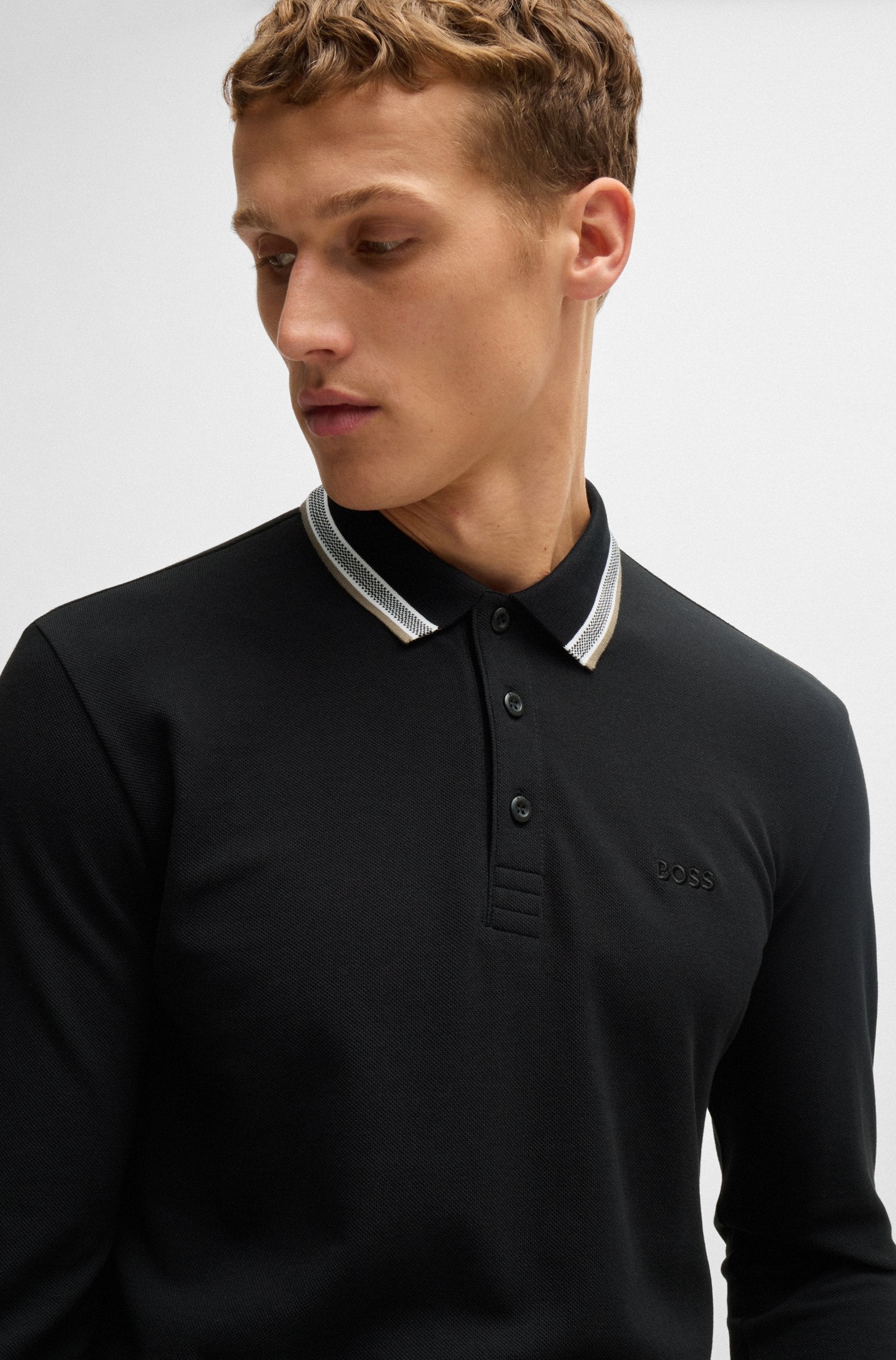 Polo manches longues noir avec col contrasté