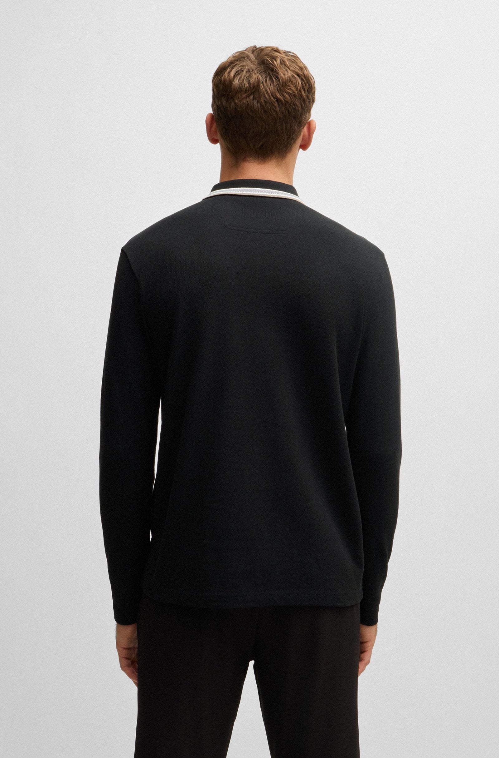 Polo manches longues noir avec col contrasté