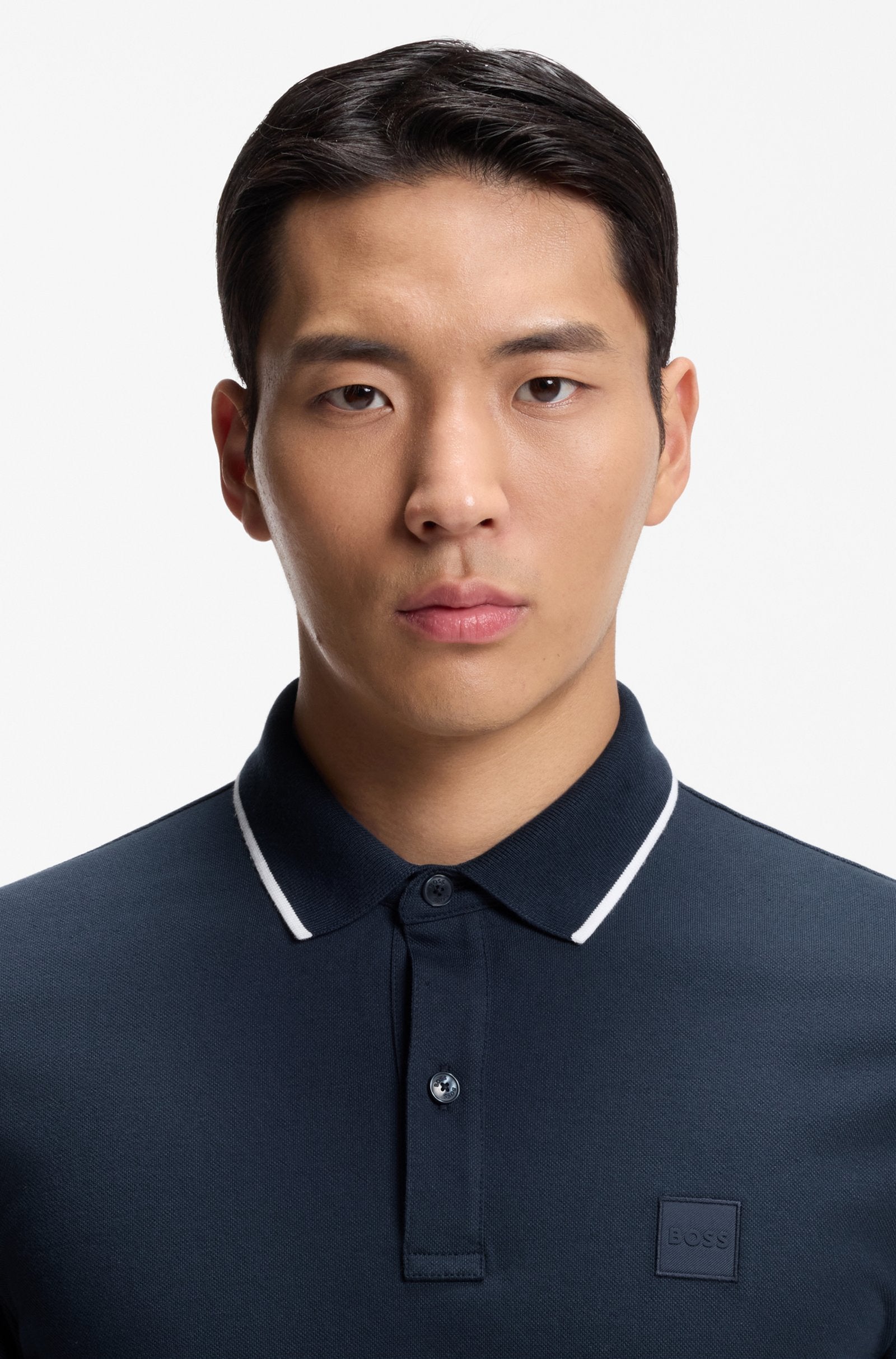 Polo slim fit en coton extensible marine