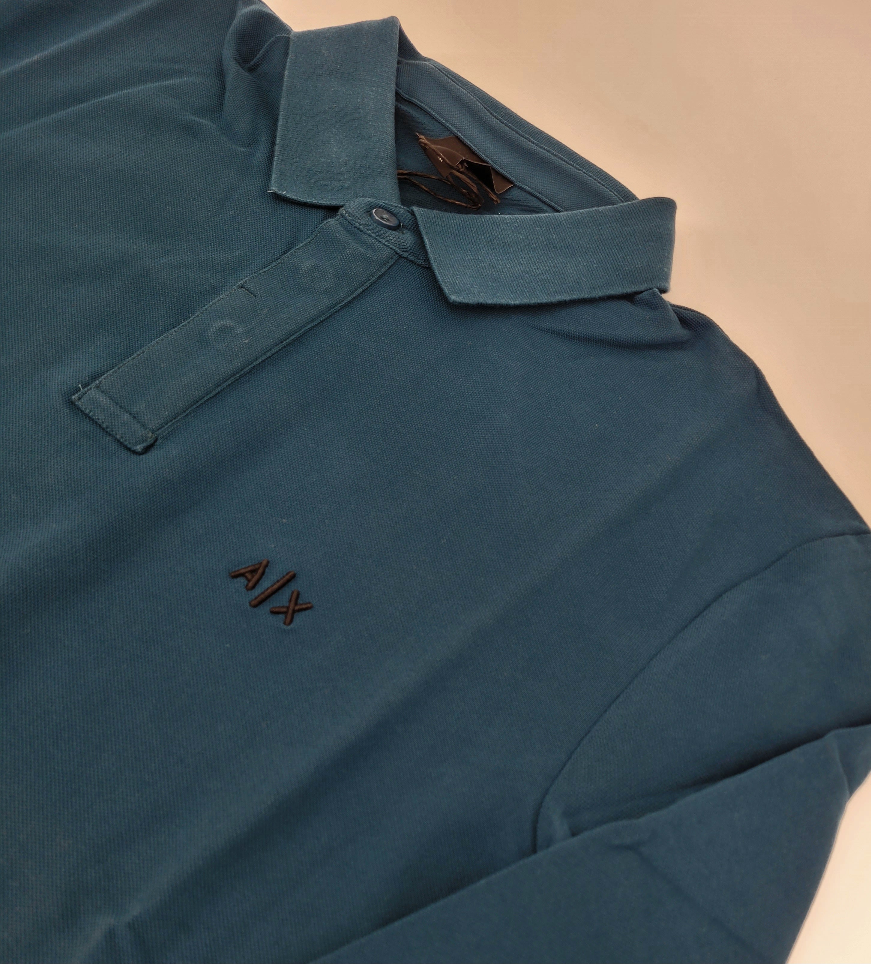 Polo manches longues en jersey de coton bleu reflet