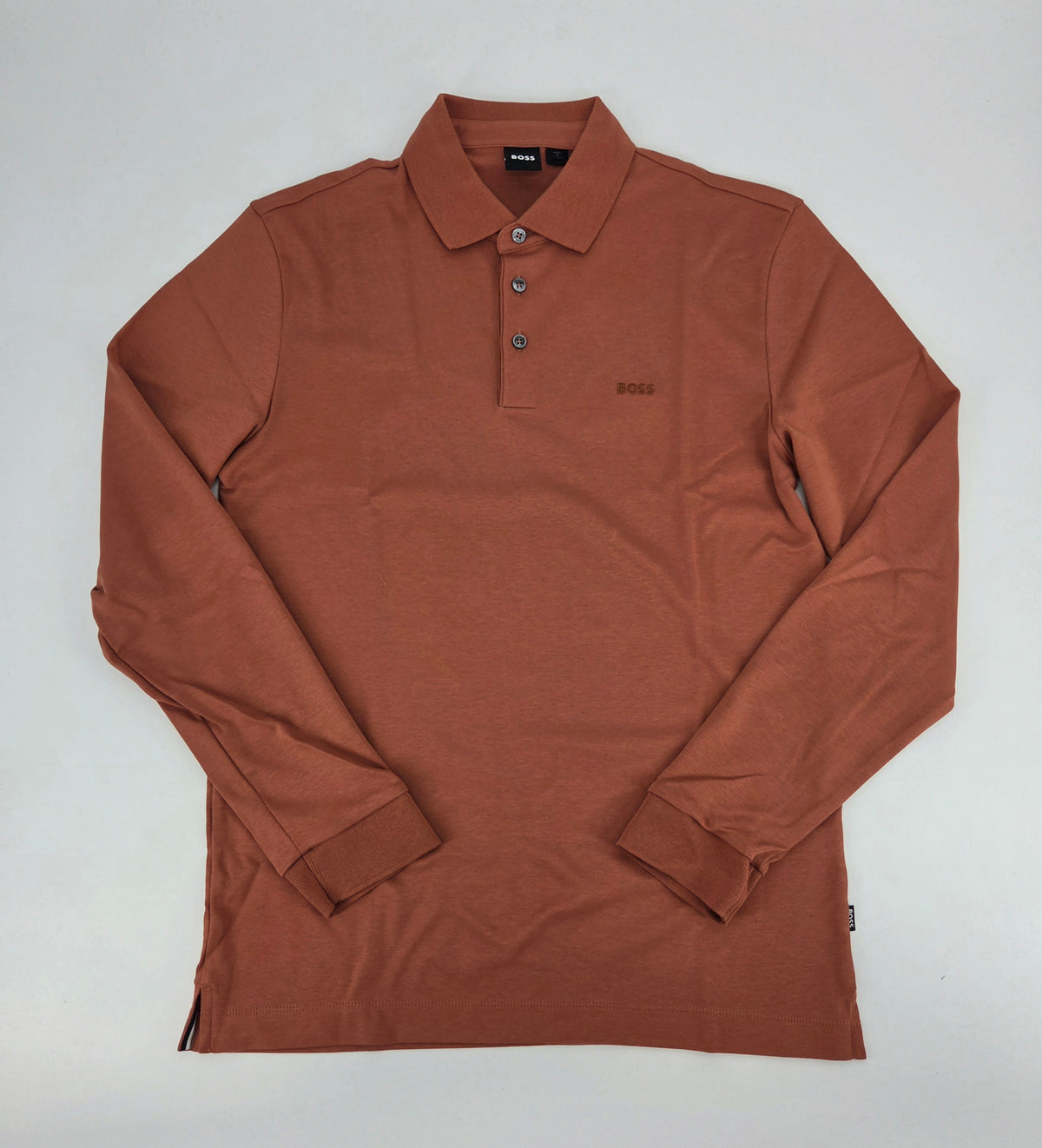 Polo manches longues orange brulé