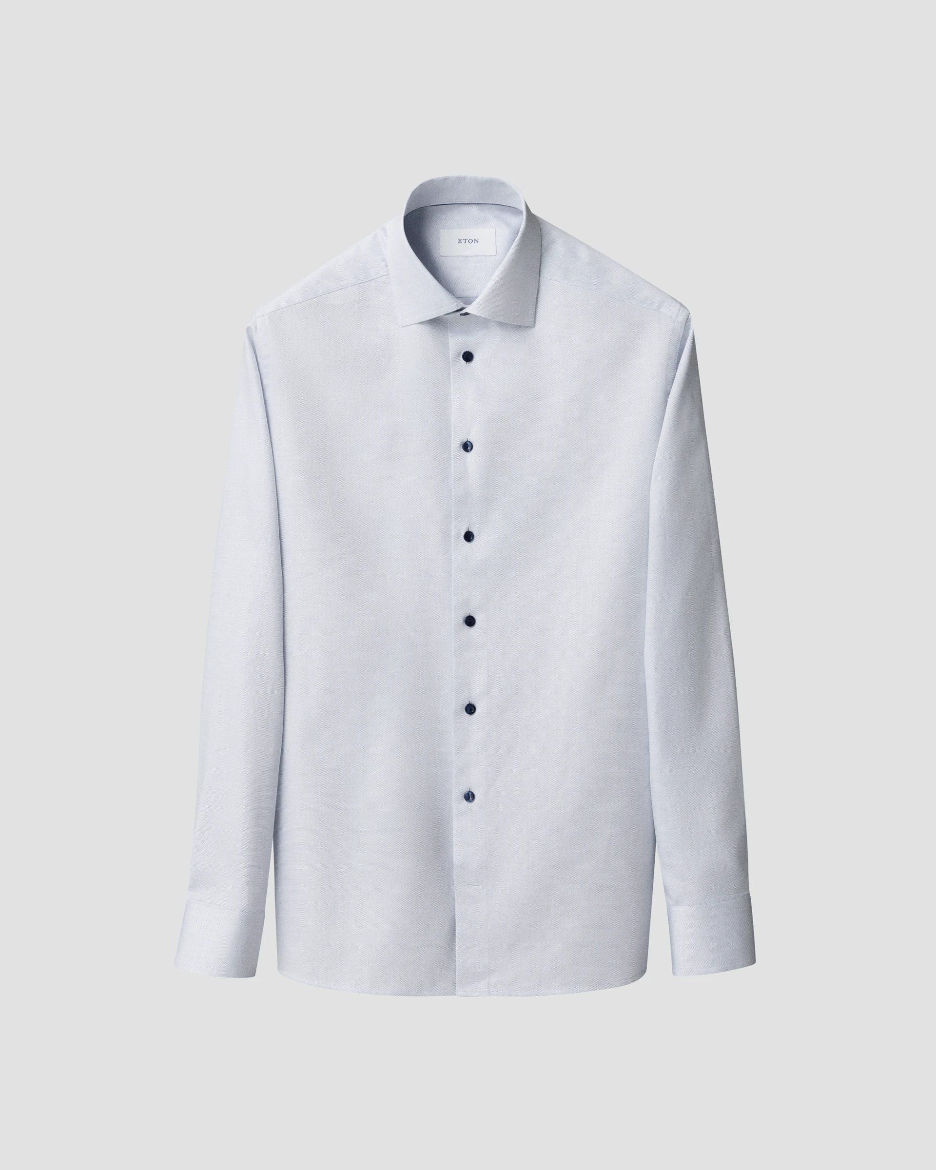 Chemise bleu avec boutons contrastés marine