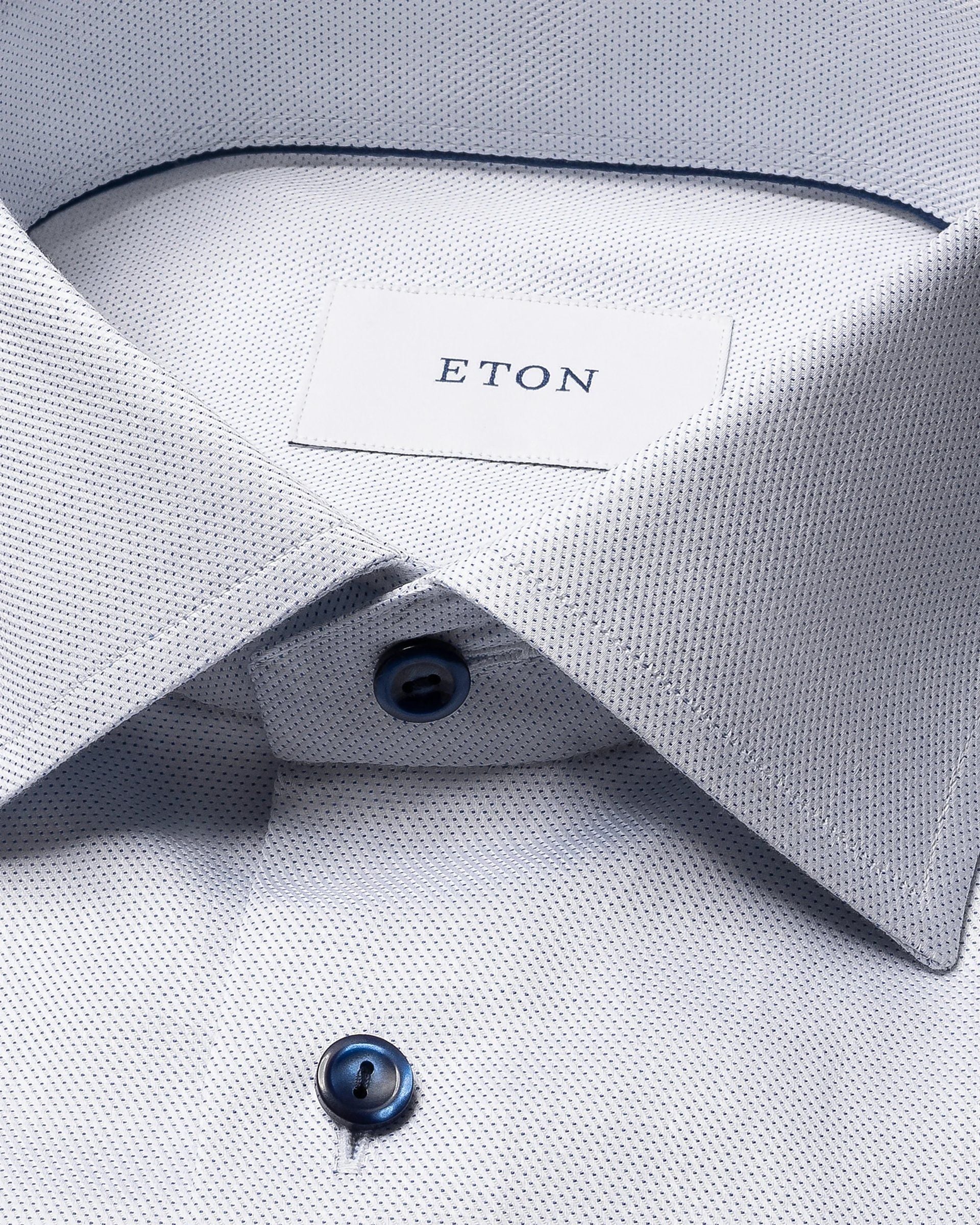 Chemise bleu avec boutons contrastés marine