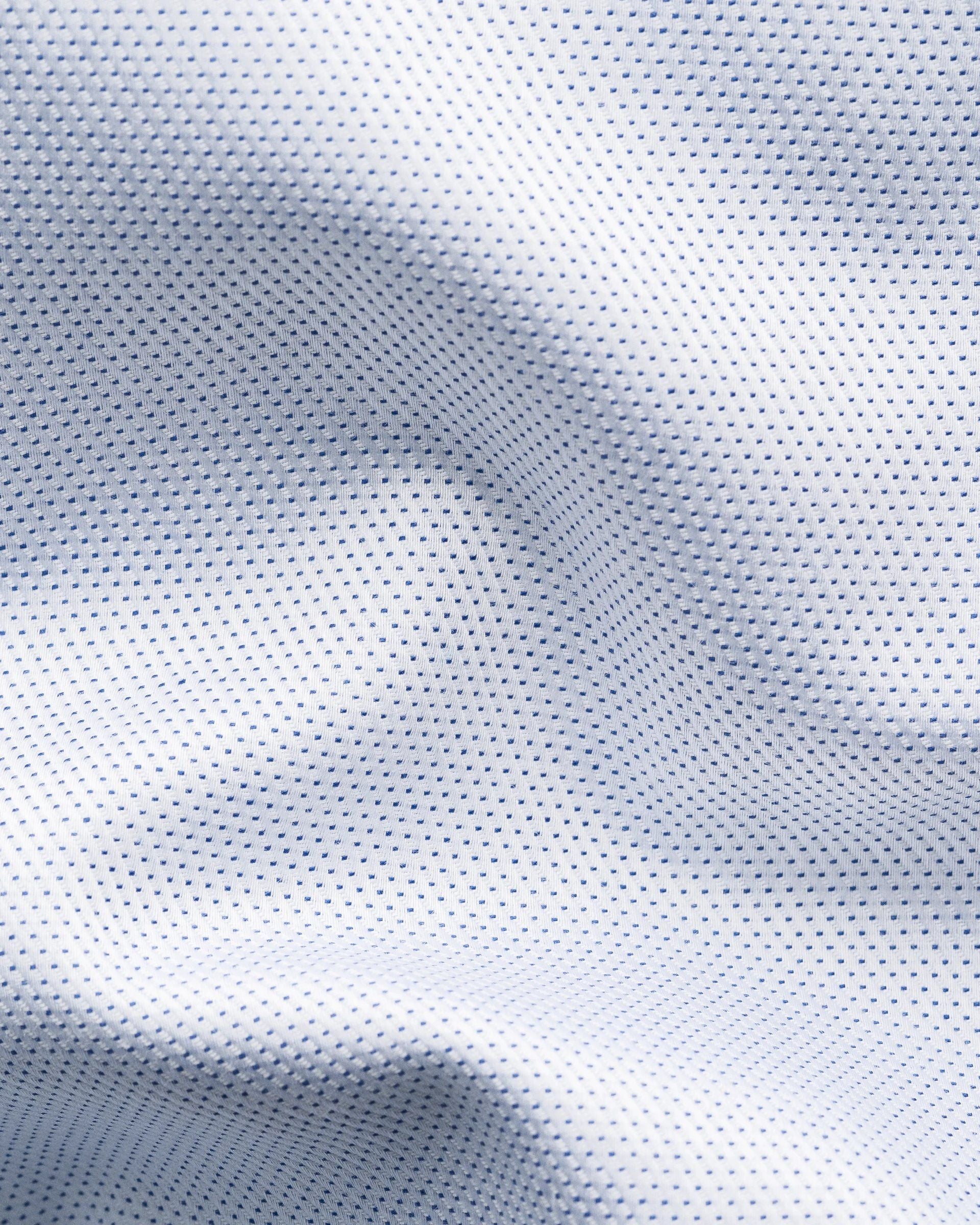 Chemise bleu avec boutons contrastés marine