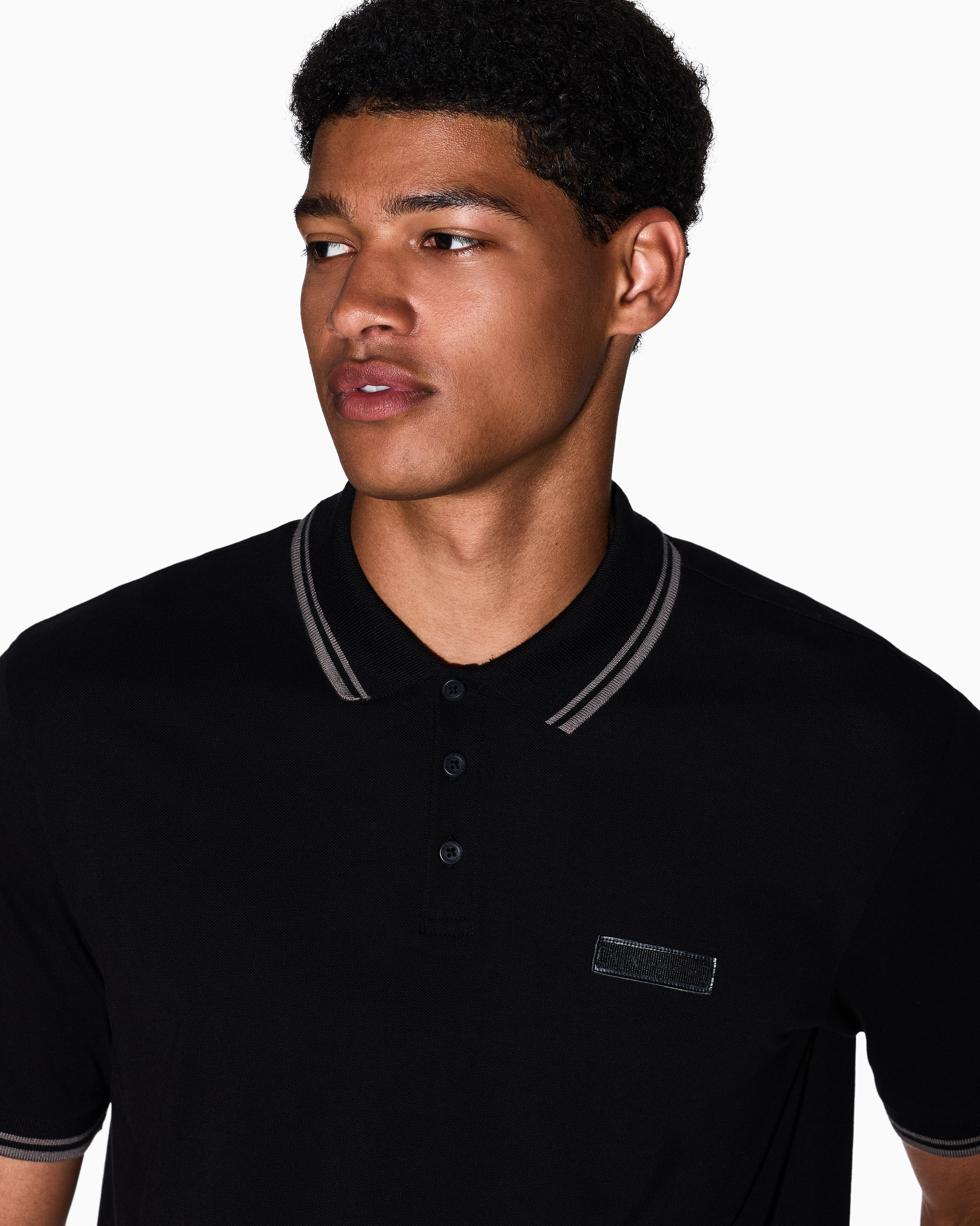 Polo en coton à détails rayés noir