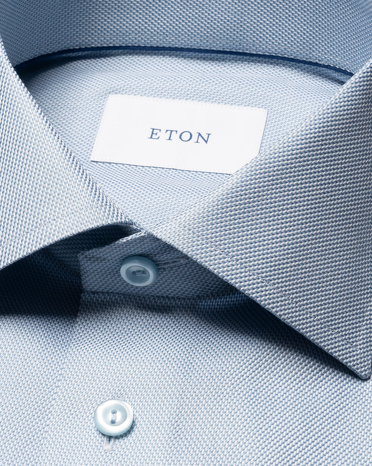 Chemise bleu pâle signature à boutons ton sur ton